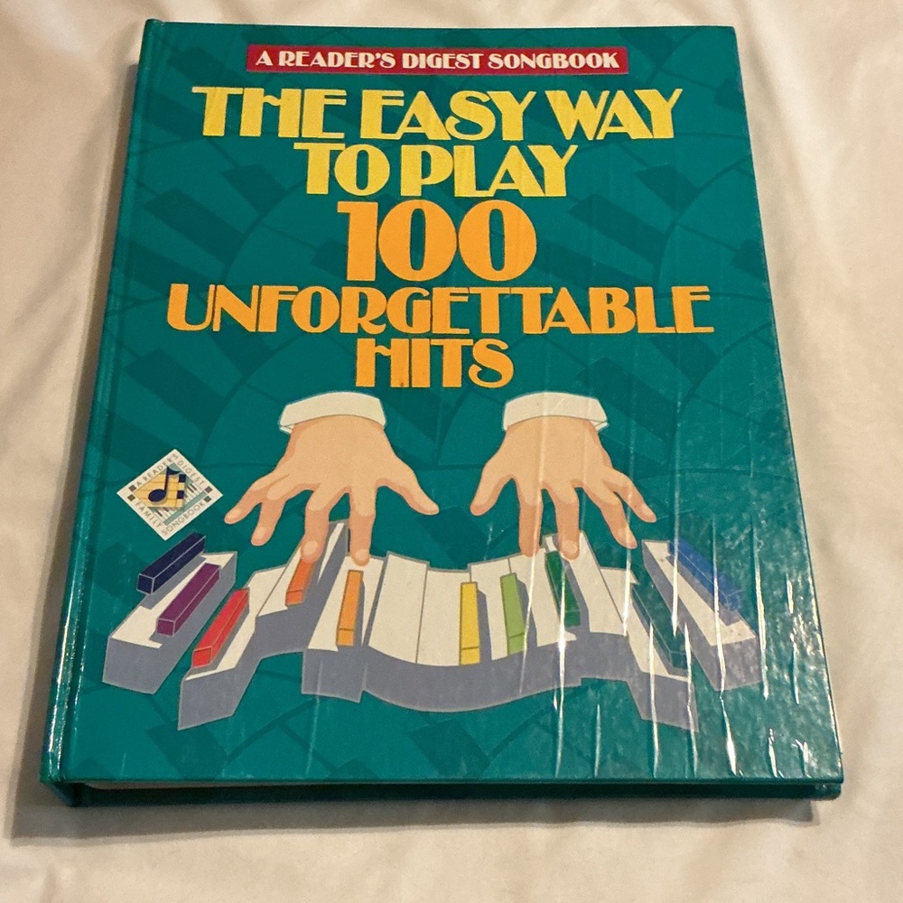 A Reader's Digest Songbook: The Easy Way to Play 100 Unforgettable Hits - Teal